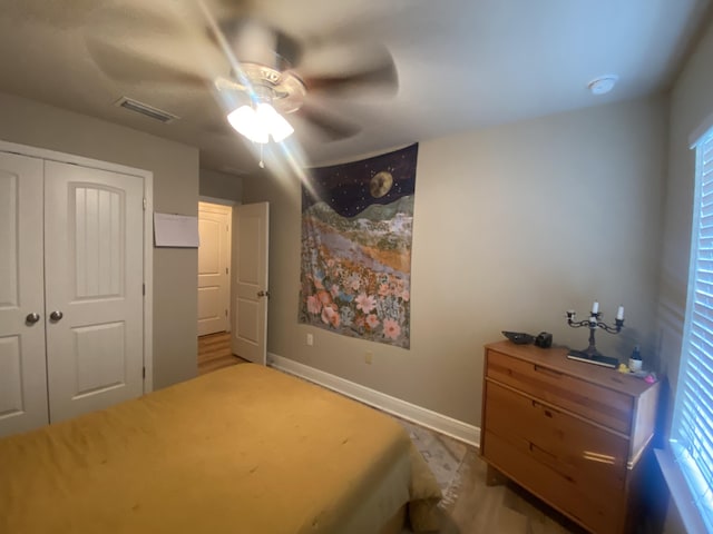 bedroom with a closet and ceiling fan