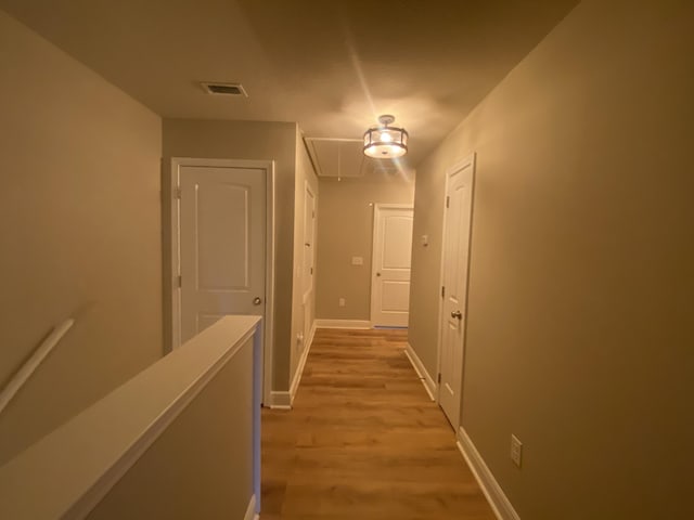 hallway featuring light hardwood / wood-style floors