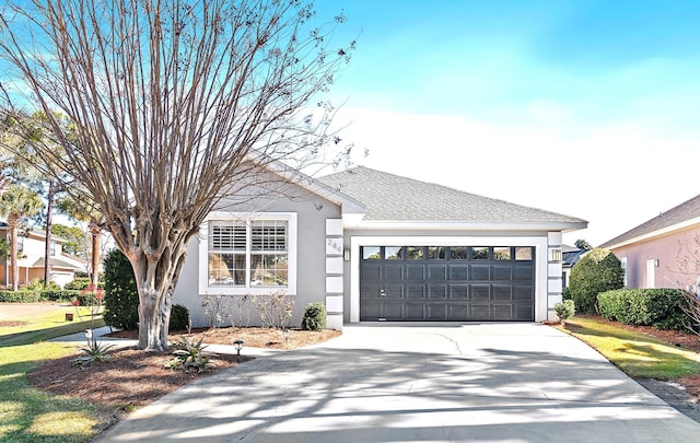 ranch-style house featuring a garage