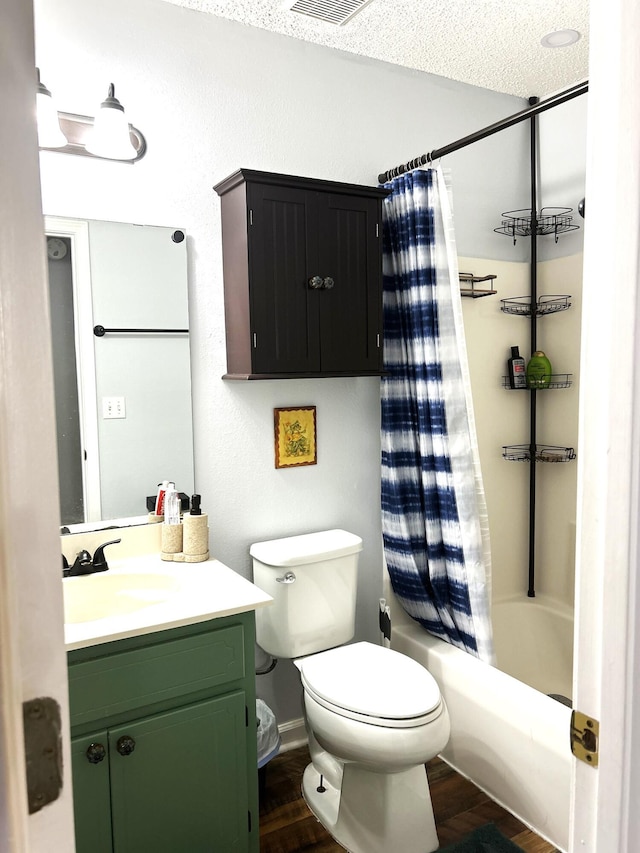 full bathroom with vanity, toilet, shower / bathtub combination with curtain, a textured ceiling, and wood-type flooring