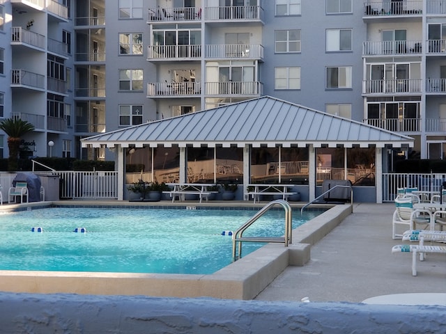 view of swimming pool with a gazebo