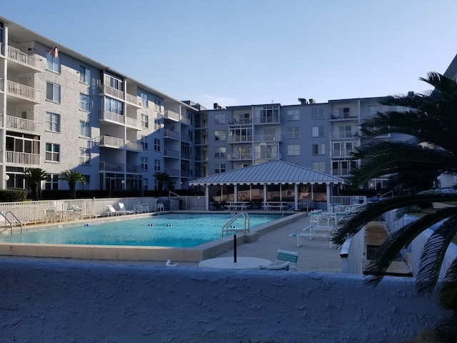 view of pool with a gazebo and a patio area