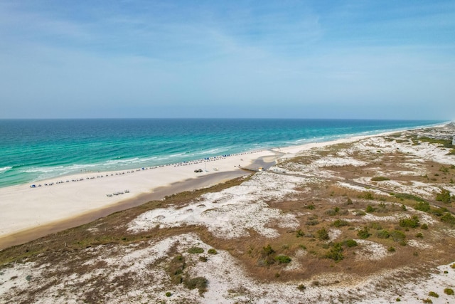 property view of water featuring a beach view