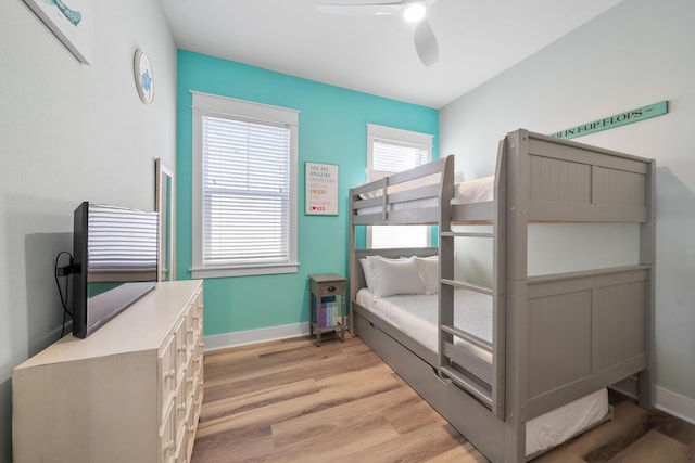 bedroom featuring ceiling fan and light hardwood / wood-style floors