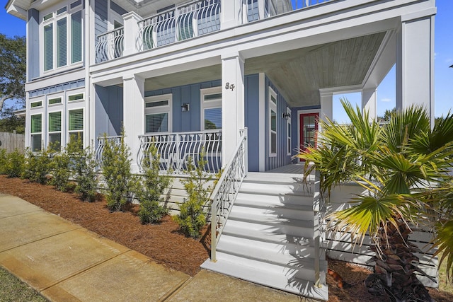 property entrance with covered porch