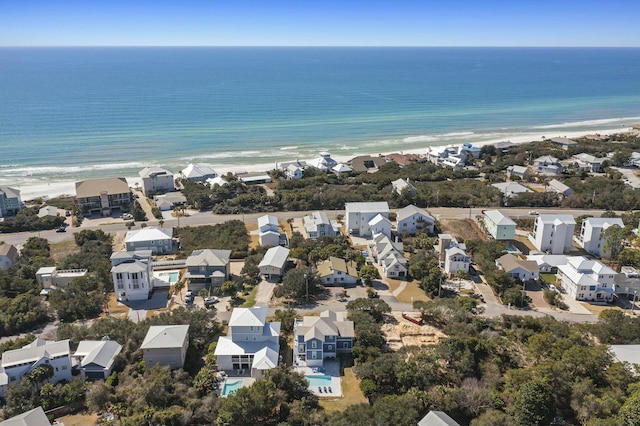 aerial view with a view of the beach and a water view