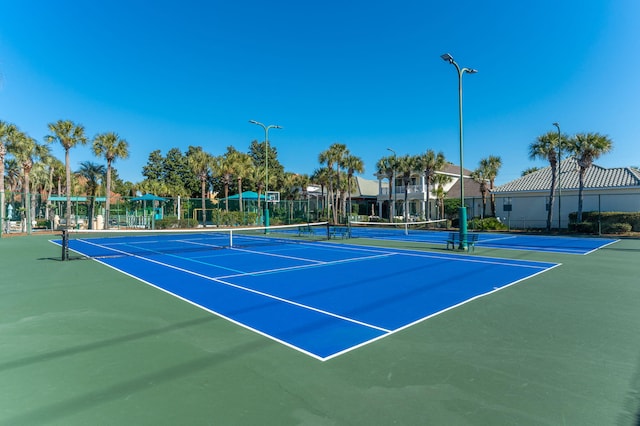 view of tennis court with basketball court