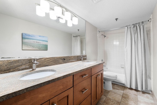 full bathroom featuring vanity, toilet, a textured ceiling, and shower / tub combo with curtain