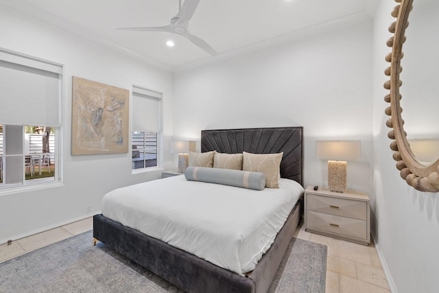 bedroom featuring ceiling fan and ornamental molding