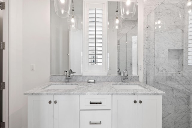 bathroom with vanity and an enclosed shower