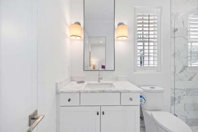 bathroom featuring walk in shower, plenty of natural light, vanity, and toilet