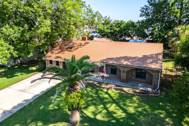 exterior space with a front yard