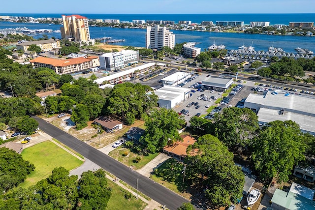 birds eye view of property with a water view