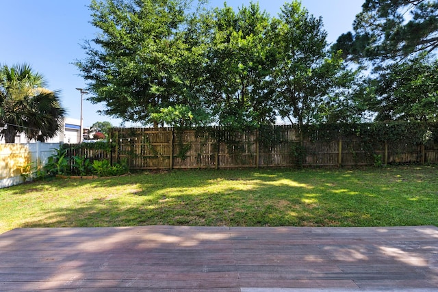 view of yard featuring a deck