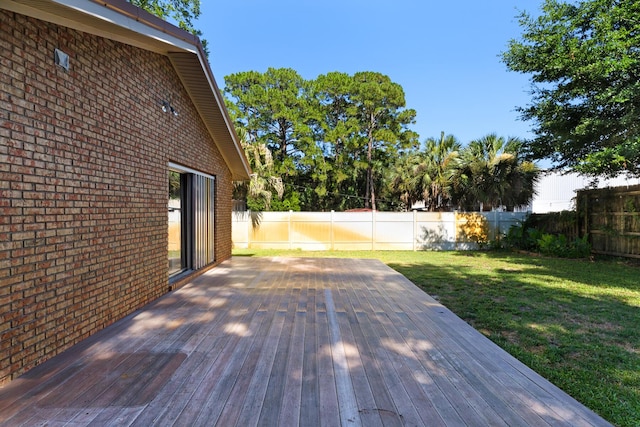 deck featuring a lawn