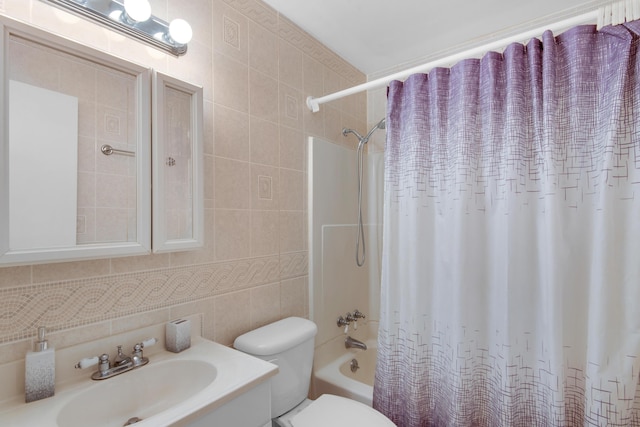 full bathroom with shower / bath combo, backsplash, vanity, tile walls, and toilet