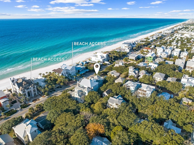 aerial view featuring a water view and a view of the beach