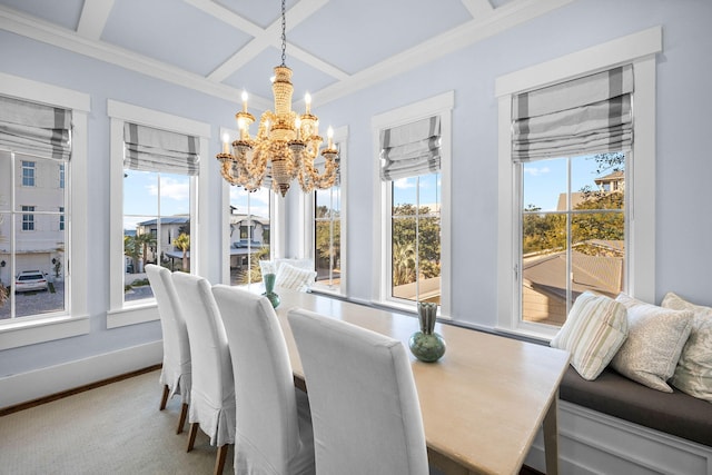 carpeted dining room featuring beam ceiling, a wealth of natural light, coffered ceiling, and a notable chandelier