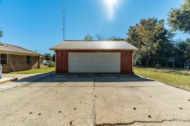 garage with a lawn