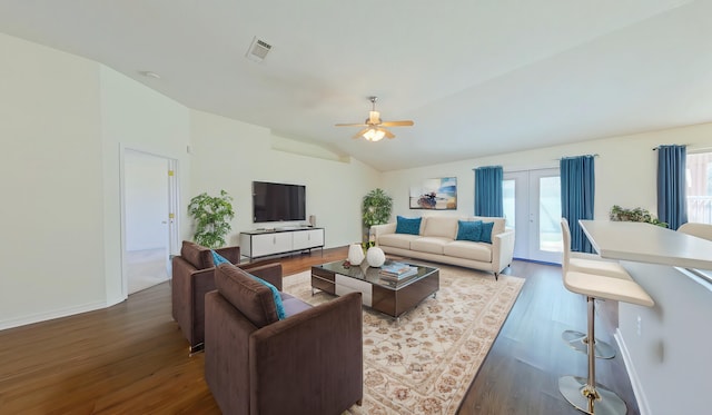 8679 High School Blvd, Navarre, FL 32566 - living room featuring wood finished floors, visible vents, lofted ceiling, ceiling fan, and french doors