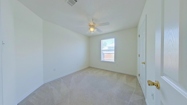 8679 High School Blvd, Navarre, FL 32566 - carpeted spare room with a ceiling fan, baseboards, and visible vents