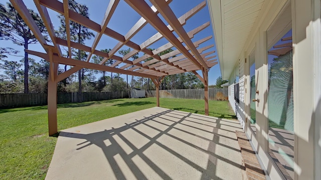 8679 High School Blvd, Navarre, FL 32566 - view of patio featuring a fenced backyard and a pergola