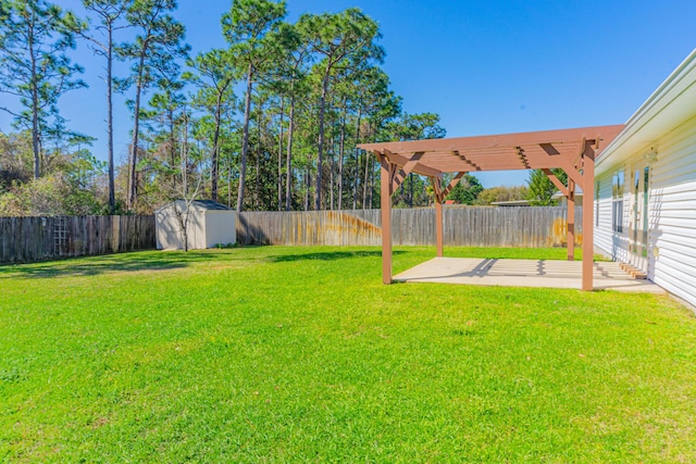 8679 High School Blvd, Navarre, FL 32566 - view of yard with a pergola, a fenced backyard, a shed, an outdoor structure, and a patio area