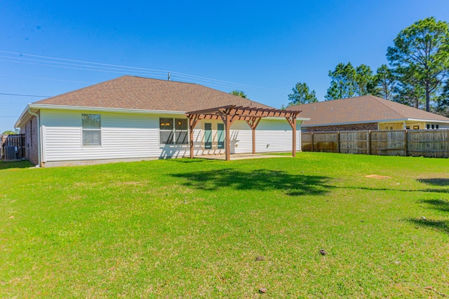 8679 High School Blvd, Navarre, FL 32566 - rear view of house with fence, central AC, roof with shingles, a yard, and a pergola