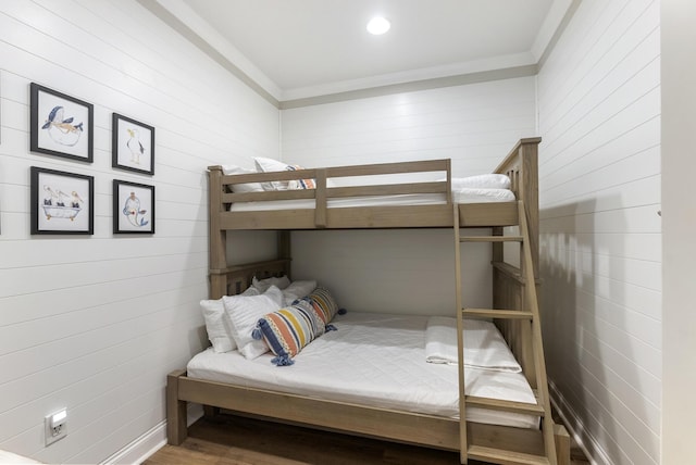 bedroom with wood-type flooring