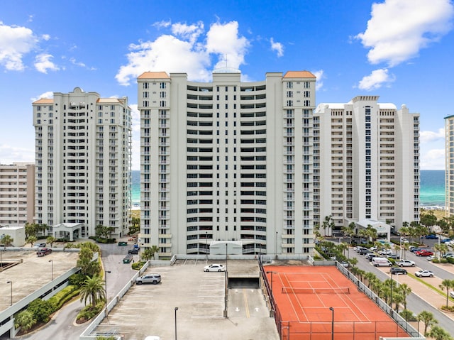 view of building exterior with a water view