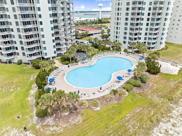 view of swimming pool with a water view