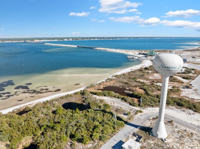 aerial view with a beach view and a water view