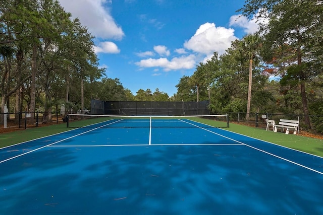 view of tennis court with basketball court