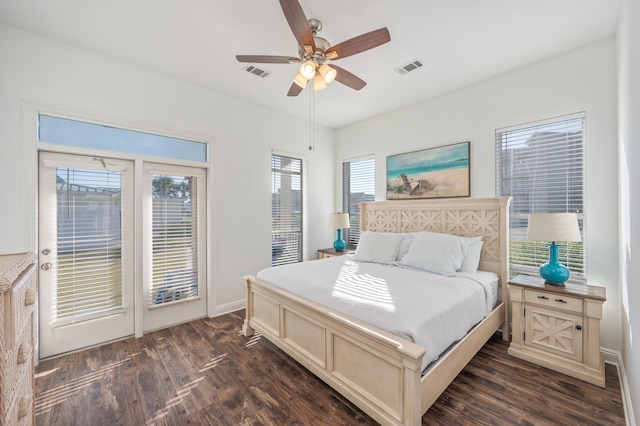 bedroom featuring dark hardwood / wood-style flooring, access to outside, and ceiling fan