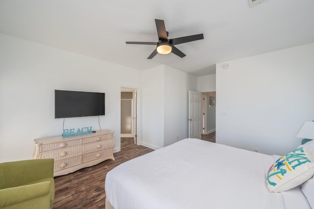 bedroom with ceiling fan and dark wood-type flooring