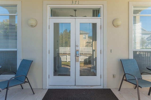 entrance to property featuring french doors