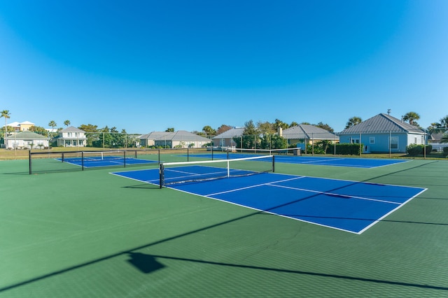 view of tennis court with basketball court