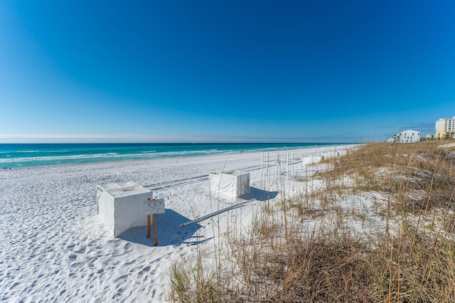 view of water feature with a beach view