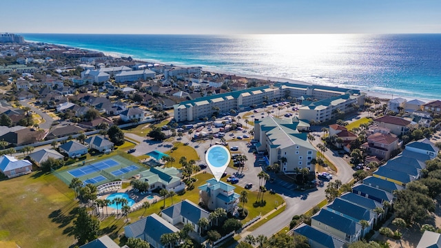 bird's eye view featuring a beach view and a water view