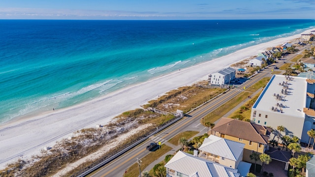 bird's eye view featuring a beach view and a water view