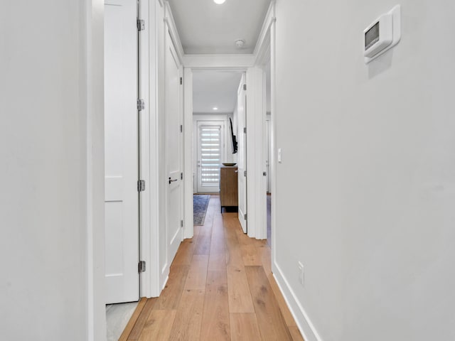 hallway featuring light hardwood / wood-style flooring