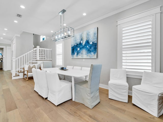 115 Woody Wagon Way, Inlet Beach, FL 32461 - dining room with ornamental molding, stairway, light wood-style flooring, a chandelier, and recessed lighting