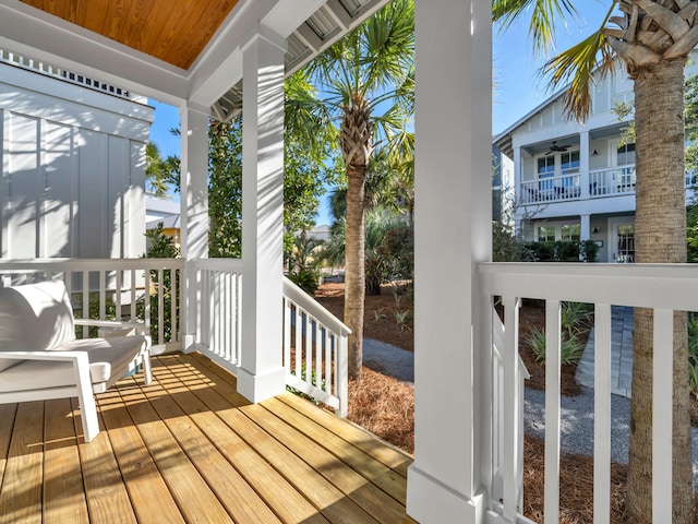 wooden terrace with a porch