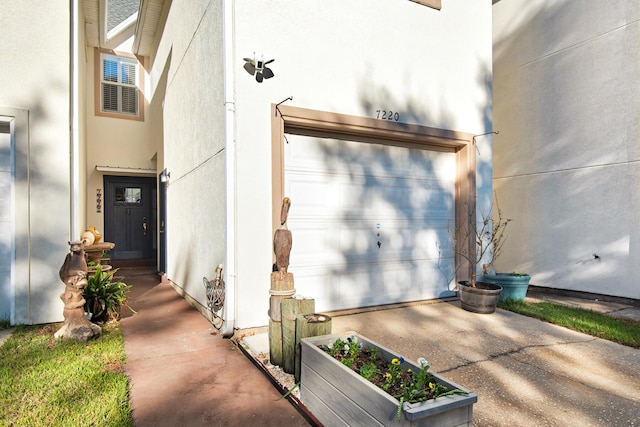 entrance to property with a garage