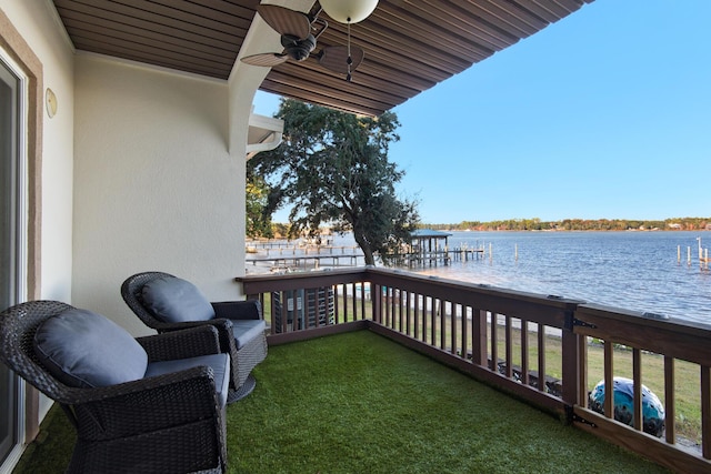 balcony featuring a water view