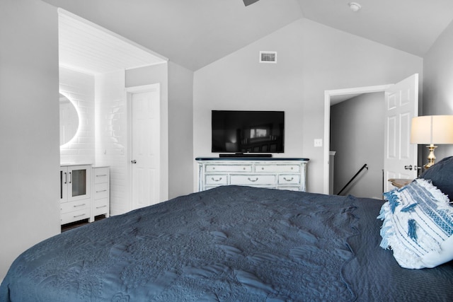 bedroom featuring lofted ceiling