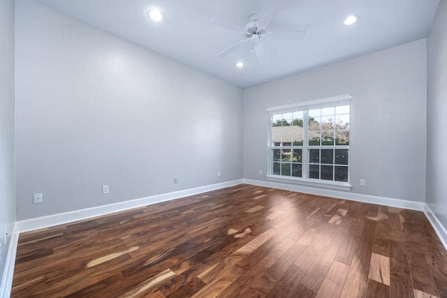 unfurnished room with recessed lighting, baseboards, dark wood-type flooring, and a ceiling fan