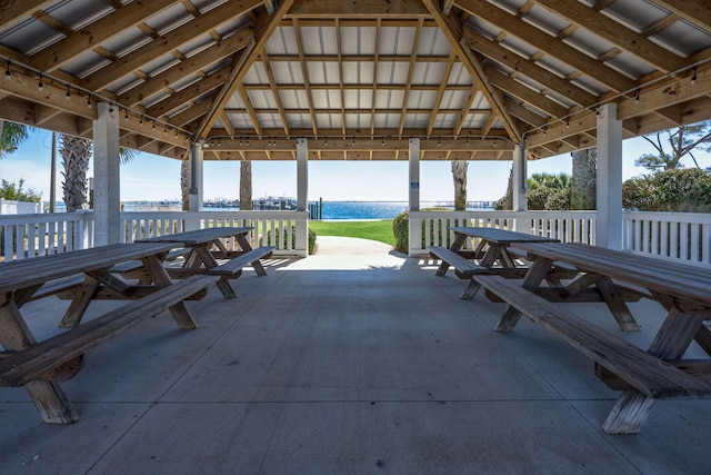 surrounding community featuring a gazebo and outdoor dining area