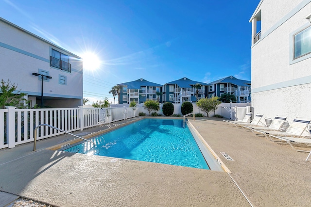 view of pool featuring a patio area