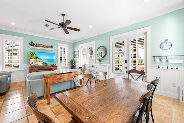 dining room featuring radiator, french doors, ceiling fan, and ornamental molding